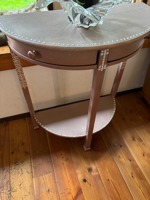 SOLD Rhinestone and crystal-encrusted pink table.