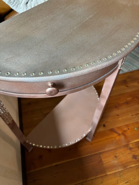 SOLD Rhinestone and crystal-encrusted pink table.