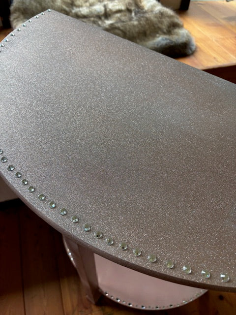 SOLD Rhinestone and crystal-encrusted pink table.