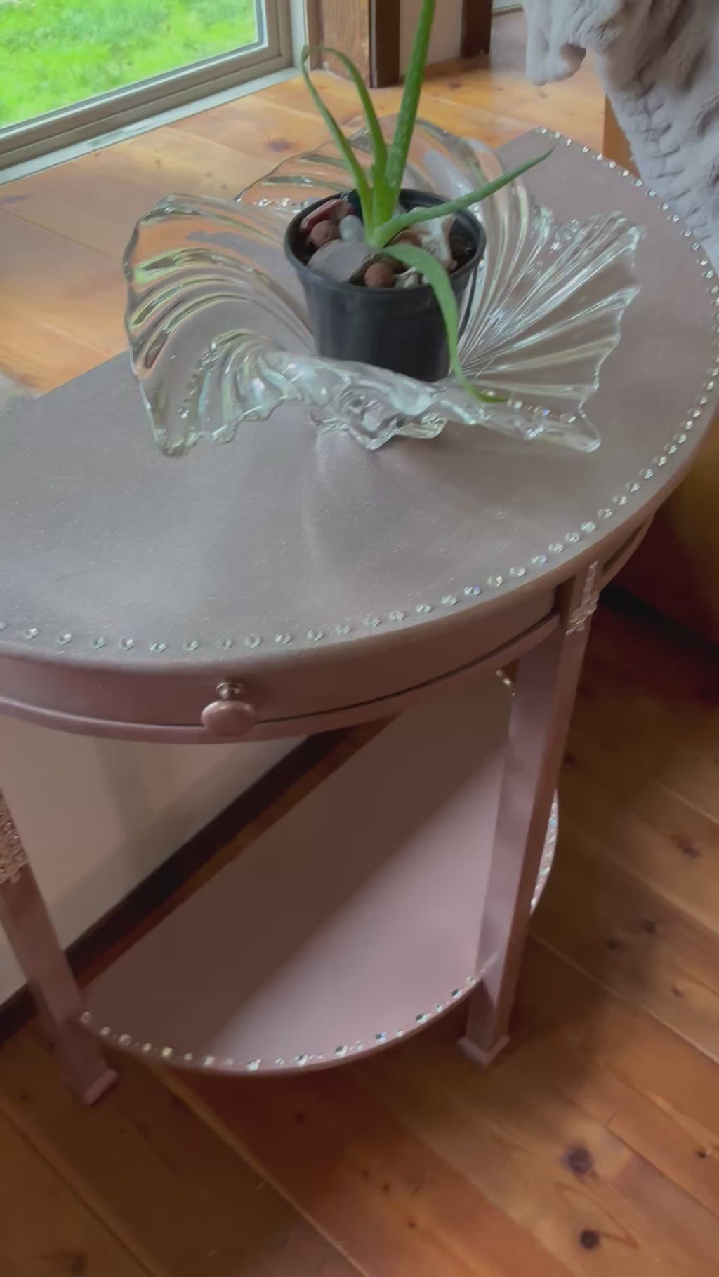 SOLD Rhinestone and crystal-encrusted pink table.